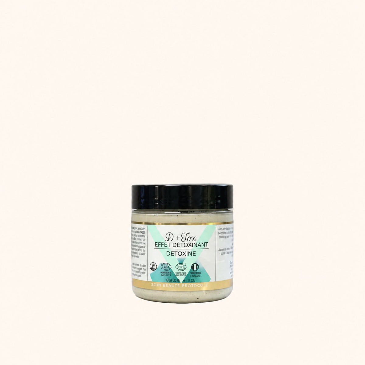 Pot de soin D-tox Effet Détoxifiant Rodolphe & Co avec couvercle noir et étiquette blanche, verte et dorée